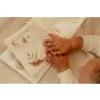 Little Dutch Textilní knížka s aktivitami Newborn Naturals